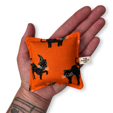 Load image into Gallery viewer, The Punchy Pillow - Black Halloween Cats on Orange
