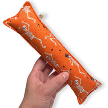 Load image into Gallery viewer, Rattle Catnip Kicker Toy - Skeletons on Orange
